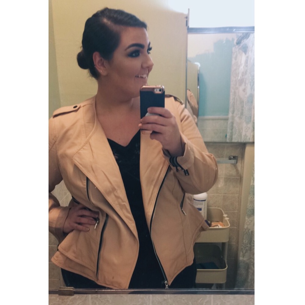 Blush lane Bryant bomber jacket with a ruffle